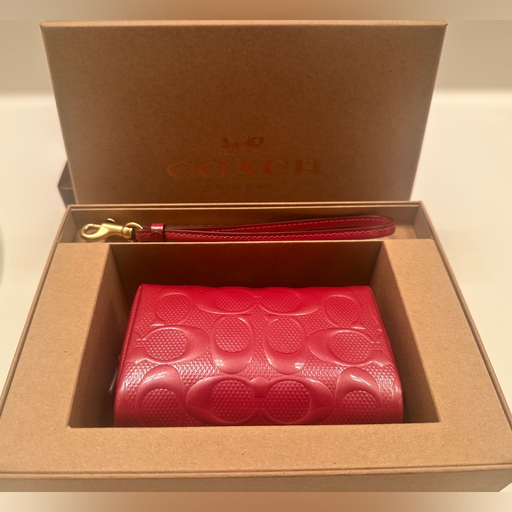 Coach Red Patent Signature
Cosmetic Case - Picture 6 of 8